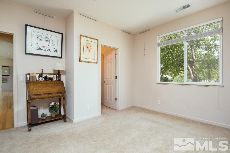 1665 Aspen Creek Road Reno, NV 89519 - Photo 18 of 25 a view of an empty room with furniture and a window
