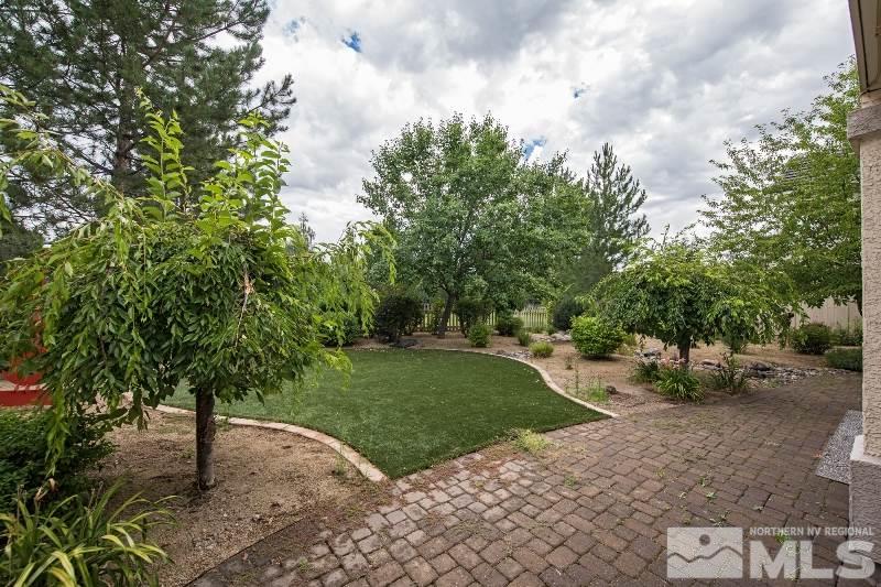 1665 Aspen Creek Road Reno, NV 89519 - Photo 20 of 25 a view of a backyard with green space