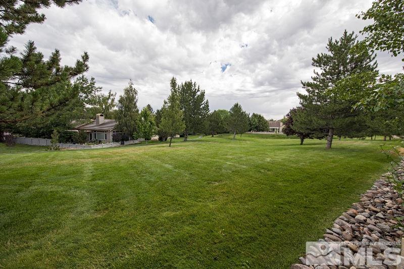 1665 Aspen Creek Road Reno, NV 89519 - Photo 22 of 25 a view of a green field