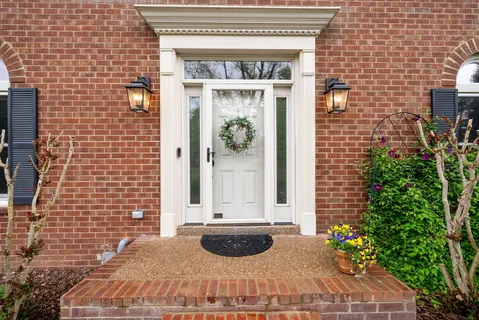 a kitchen with stainless steel appliances granite countertop a stove and a refrigerator