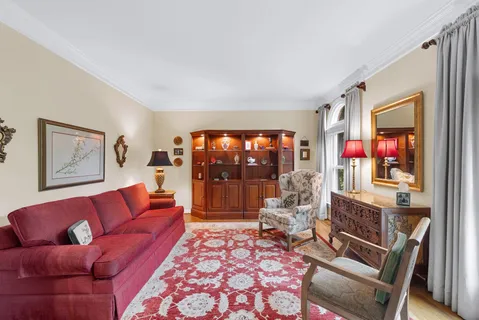 a bed room with a bed and a ceiling fan