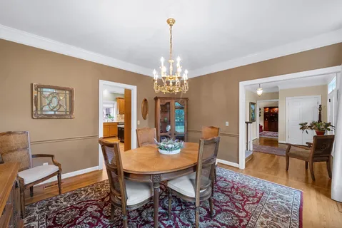 a room with a bed and a table in it