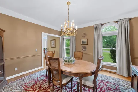 a view of a swimming pool with an outdoor space and seating area