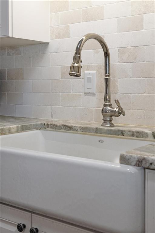 16931 Southwest 133 Street Cedar Key, FL 32625 - Photo 32 of 57 a close view of a faucet a sink and a tap