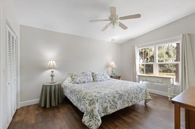 a view of balcony with two chairs and wooden floor