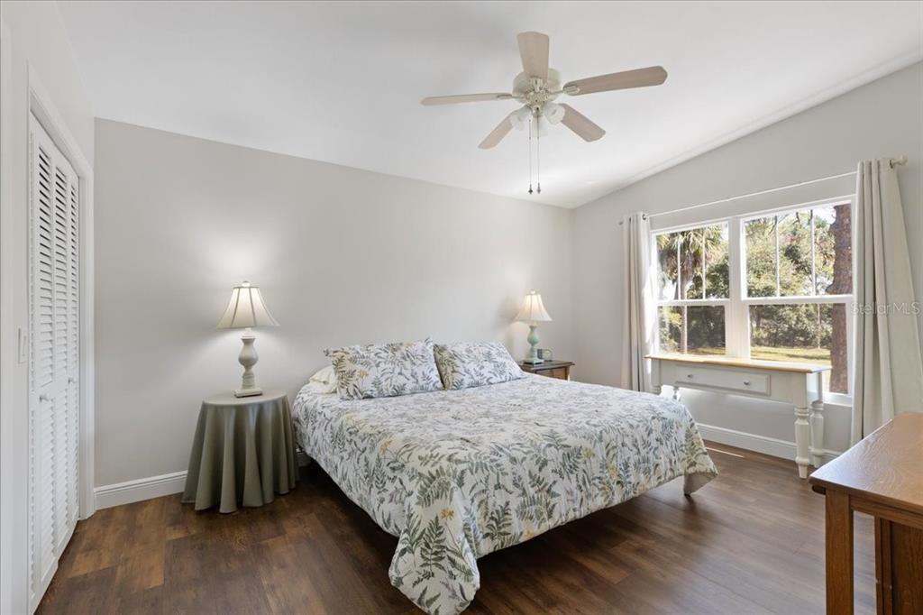 16931 Southwest 133 Street Cedar Key, FL 32625 - Photo 40 of 57 a bedroom with a bed and a window