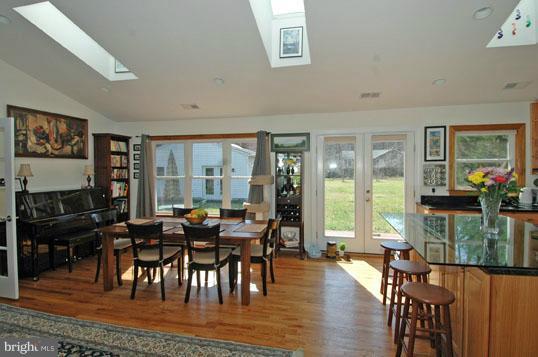 108 Farmington Road West Accokeek, MD 20607 - Photo 2 of 30 a view of a dining room with furniture window and wooden floor