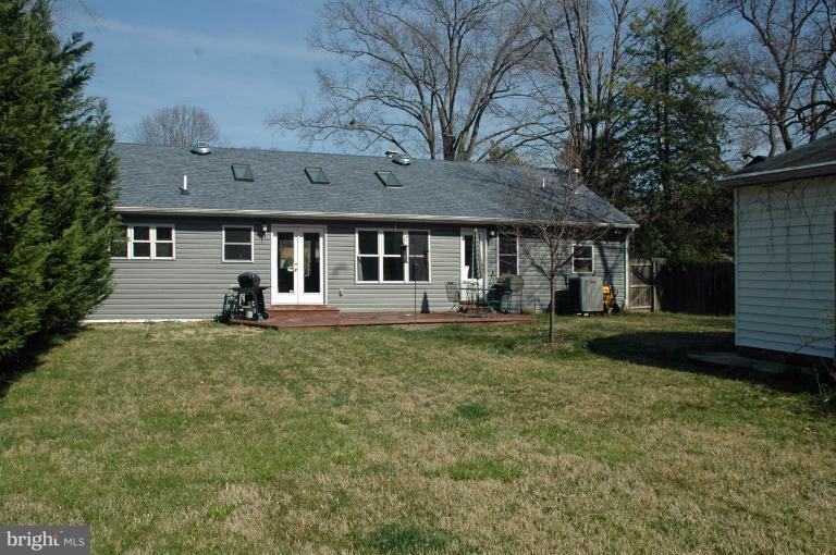 108 Farmington Road West Accokeek, MD 20607 - Photo 16 of 30 front view of a house with a yard
