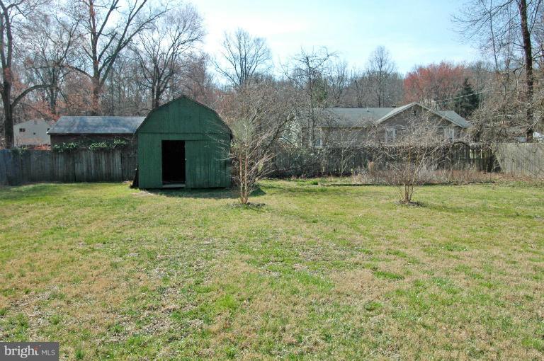 108 Farmington Road West Accokeek, MD 20607 - Photo 17 of 30 a backyard of a house with lots of green space