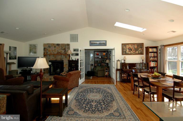 108 Farmington Road West Accokeek, MD 20607 - Photo 22 of 30 a living room with furniture and a fireplace