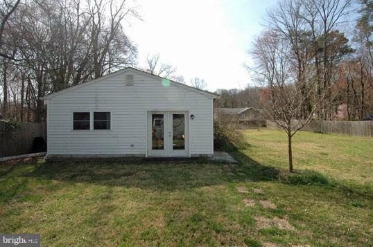 108 Farmington Road West Accokeek, MD 20607 - Photo 24 of 30 a view of a house with a backyard
