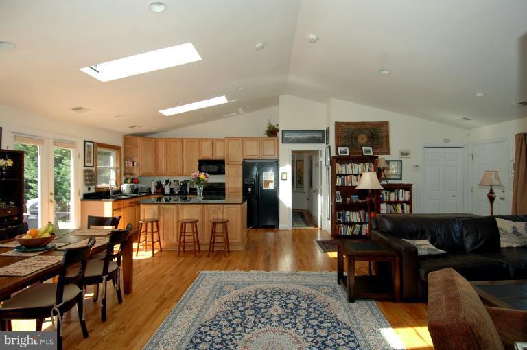 108 Farmington Road West Accokeek, MD 20607 - Photo 30 of 30 a living room with furniture kitchen view and a large window