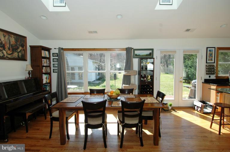 108 Farmington Road West Accokeek, MD 20607 - Photo 6 of 30 a view of a dining room with furniture window and wooden floor