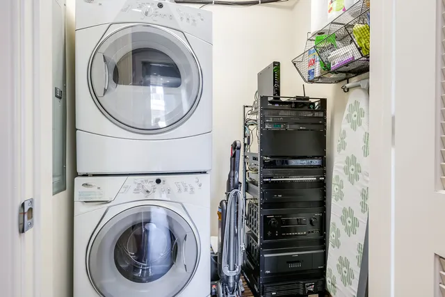 a bedroom with a bed and a cabinets