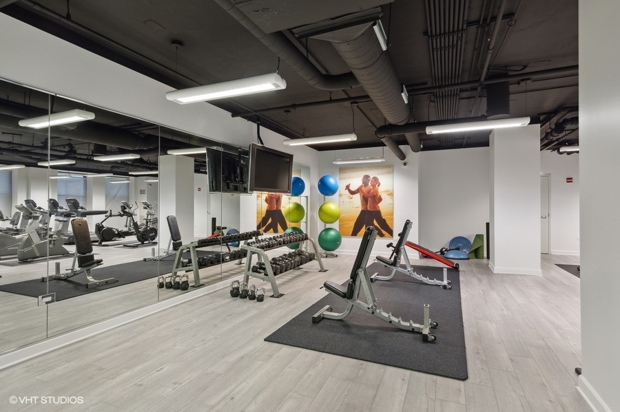 310 South Michigan Avenue, Unit 1900 Chicago, IL 60604 - Photo 24 of 25 a view of a room with gym equipment