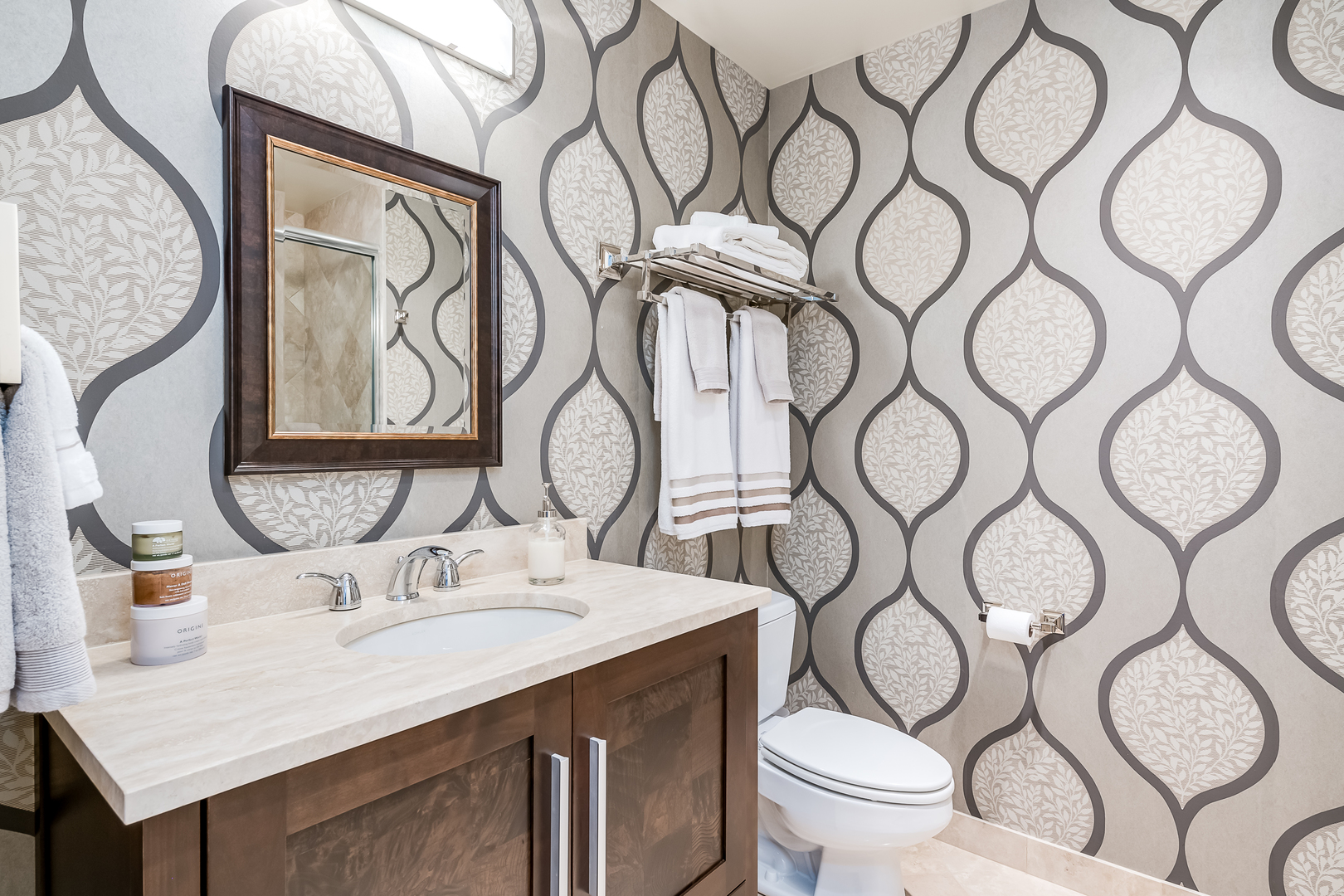 310 South Michigan Avenue, Unit 1900 Chicago, IL 60604 - Photo 9 of 25 a bathroom with a toilet sink and mirror