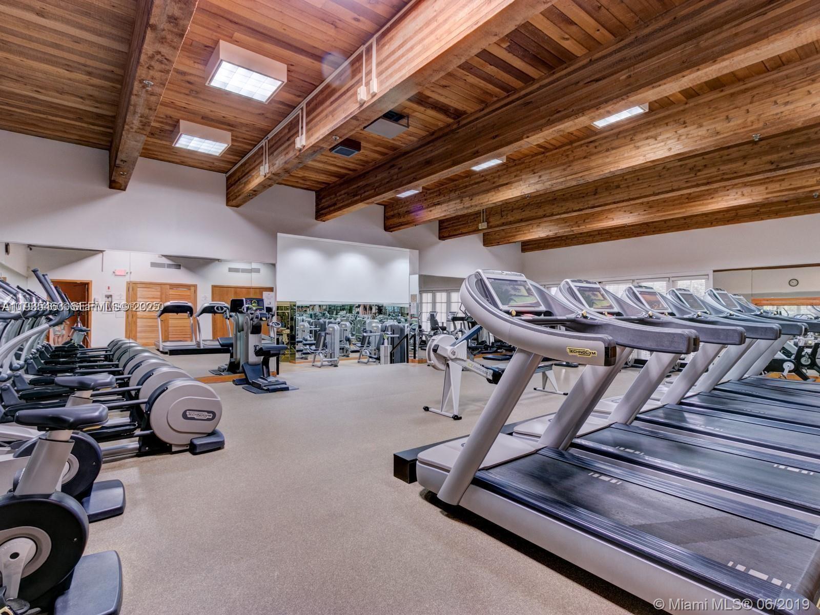 2000 Towerside Terrace, Unit 905 Miami, FL 33138 - Photo 20 of 24 a view of a room with gym equipment