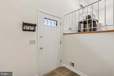 a view of a hallway with workspace