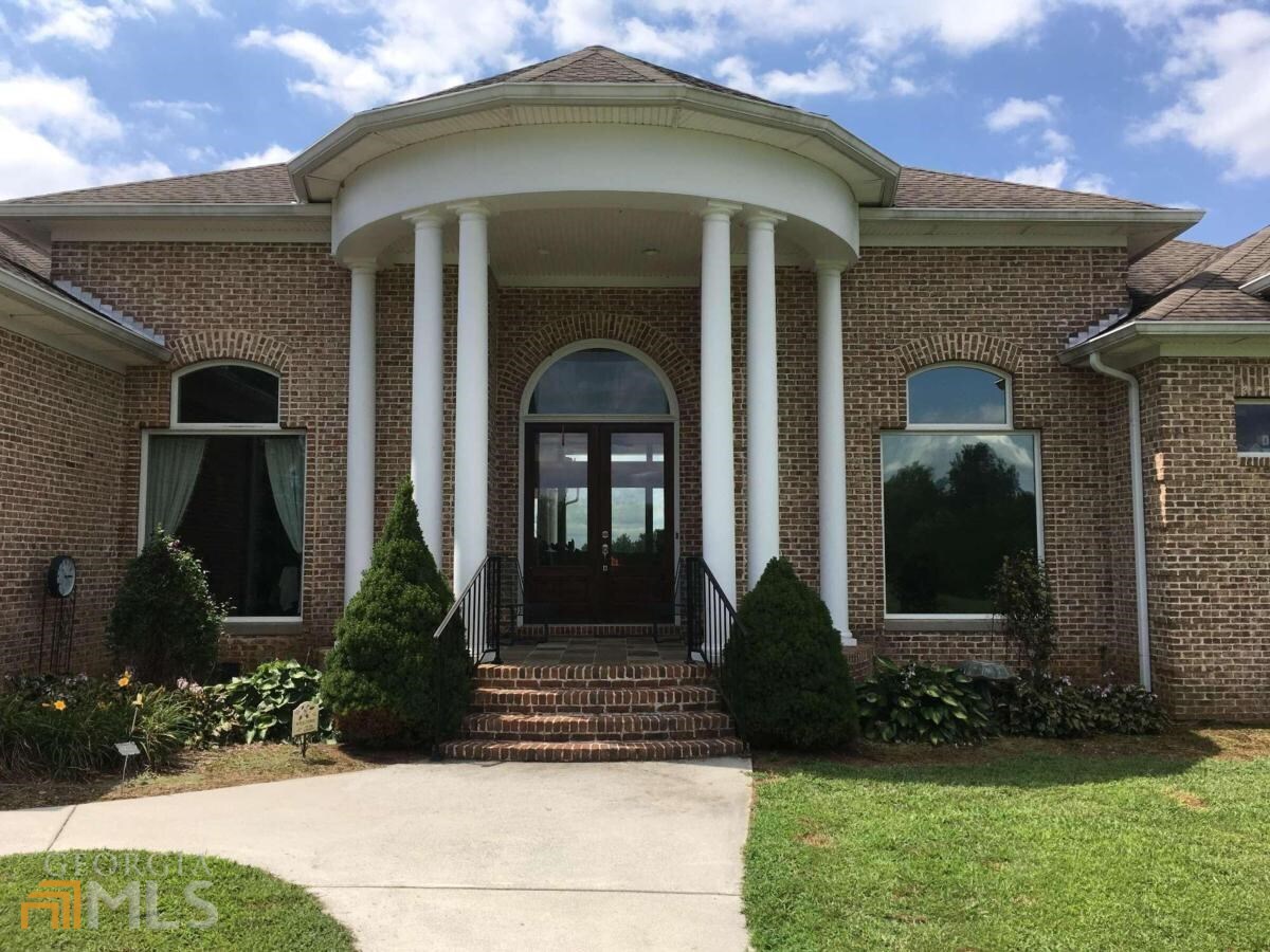 942 Goat Road Northwest Resaca, GA 30735 - Photo 1 of 1 a front view of a house