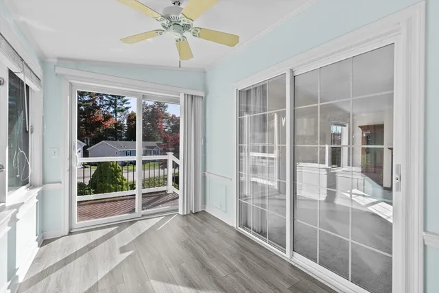 a view of a room with a large window