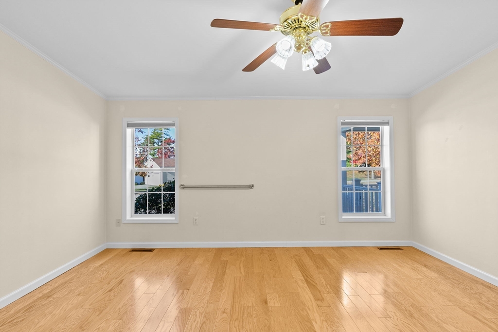 2602 Pheasant Lane Middleboro, MA 02346 - Photo 20 of 40 an empty room with windows and fan