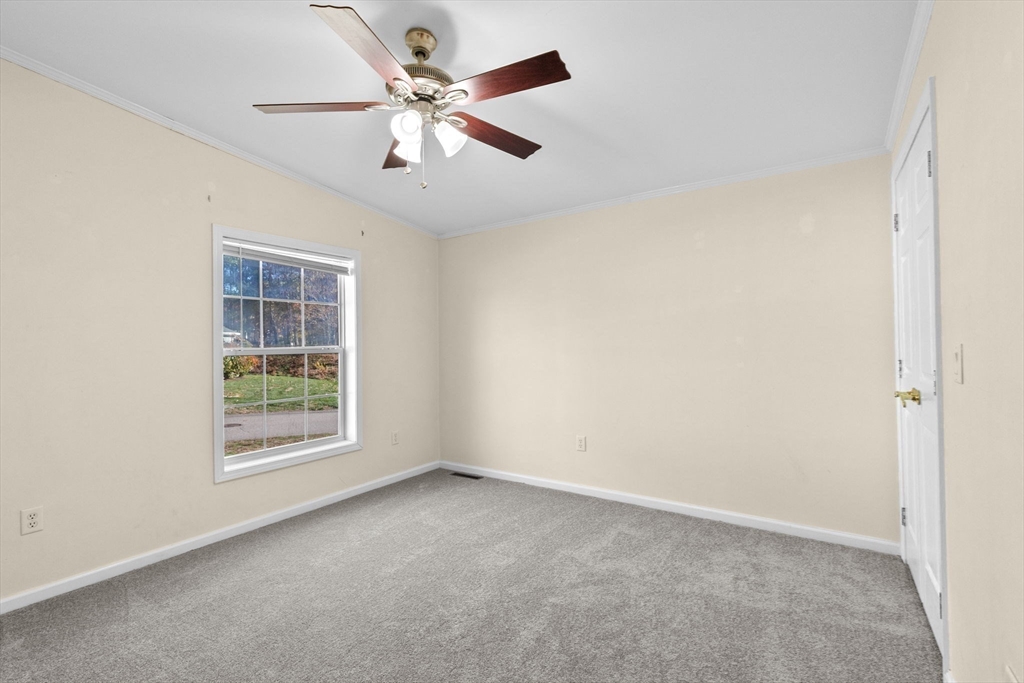 2602 Pheasant Lane Middleboro, MA 02346 - Photo 26 of 40 an empty room with windows and fan