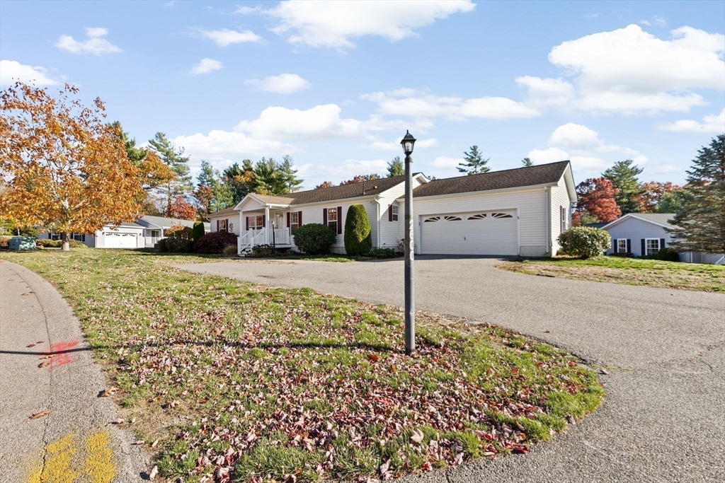 2602 Pheasant Lane Middleboro, MA 02346 - Photo 38 of 40 a view of a house with a yard