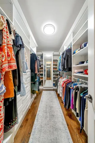 a room with furniture and wooden floor