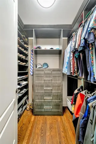 a view of a chairs and table in the backyard