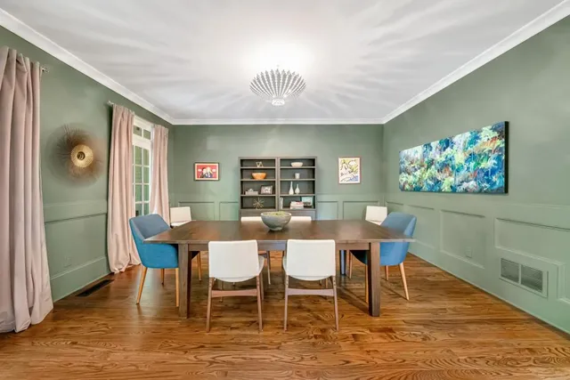 a kitchen with stainless steel appliances granite countertop a sink and a window