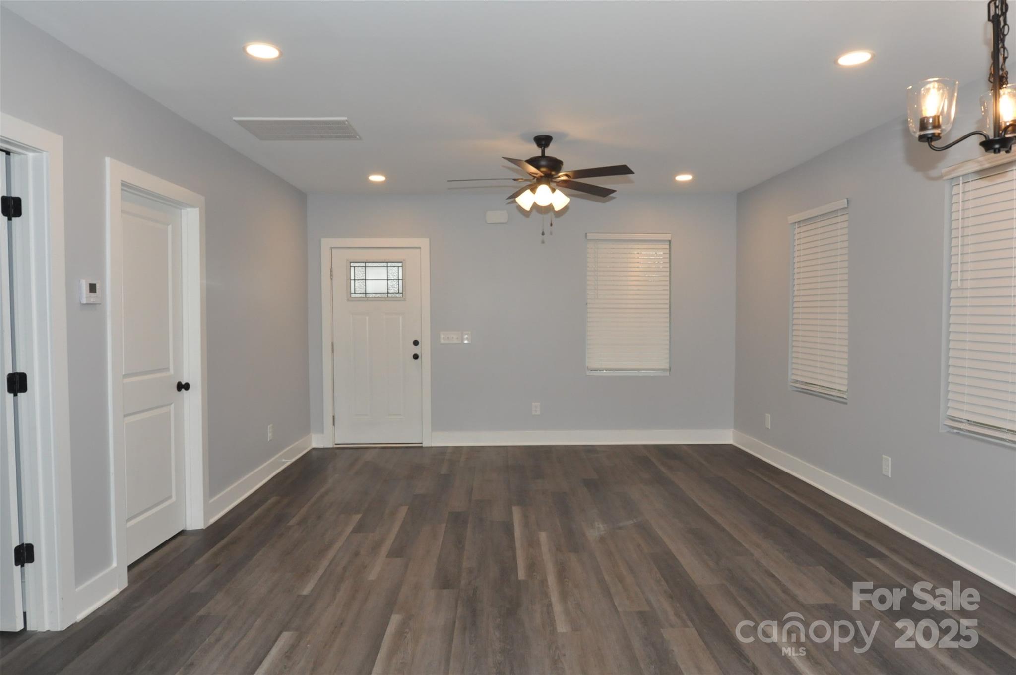 560 2nd Street, Unit 16 Chester, SC 29706 - Photo 12 of 25 wooden floor in an empty room with a window
