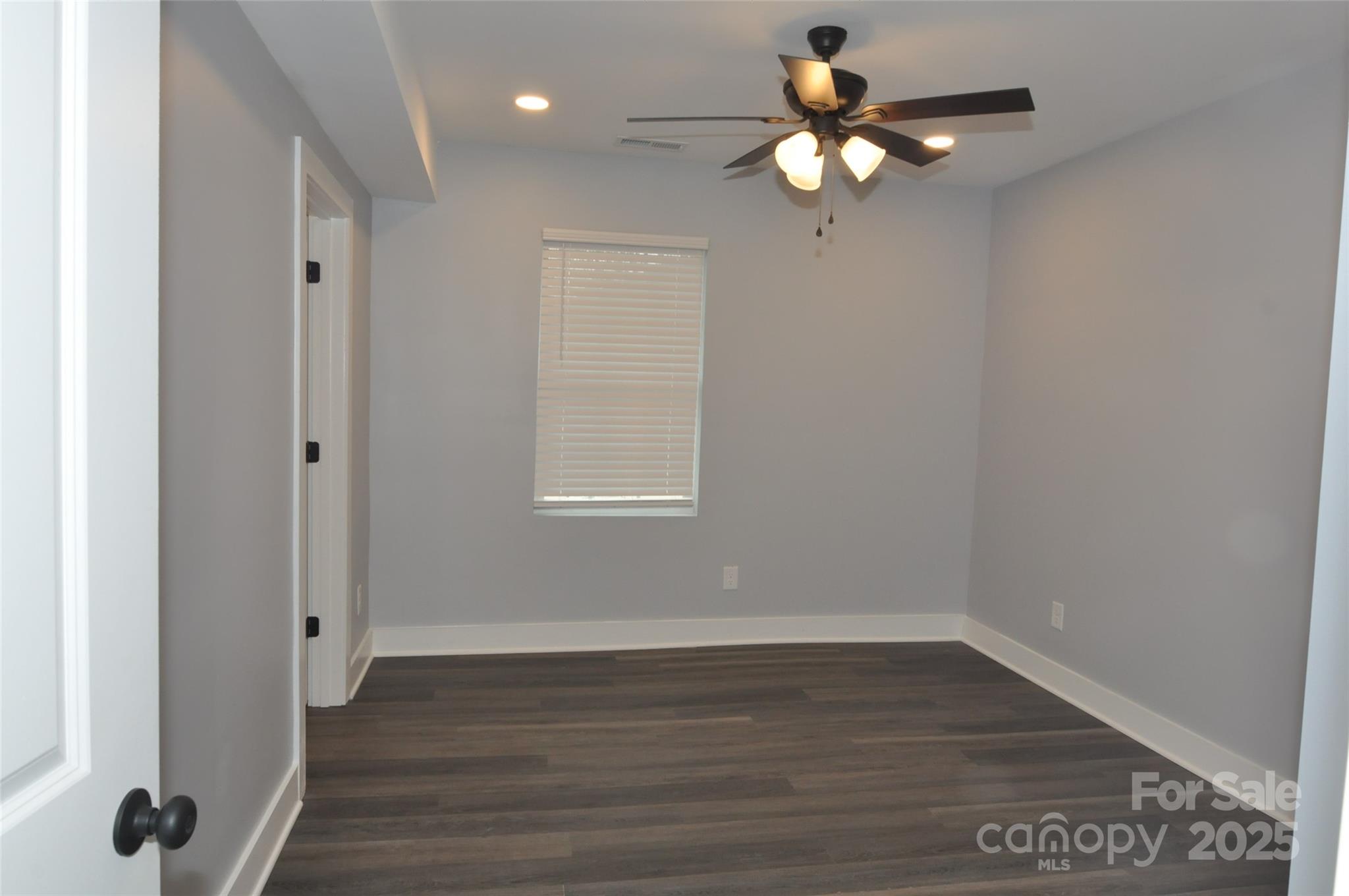 560 2nd Street, Unit 16 Chester, SC 29706 - Photo 20 of 25 wooden floor in an empty room with a window
