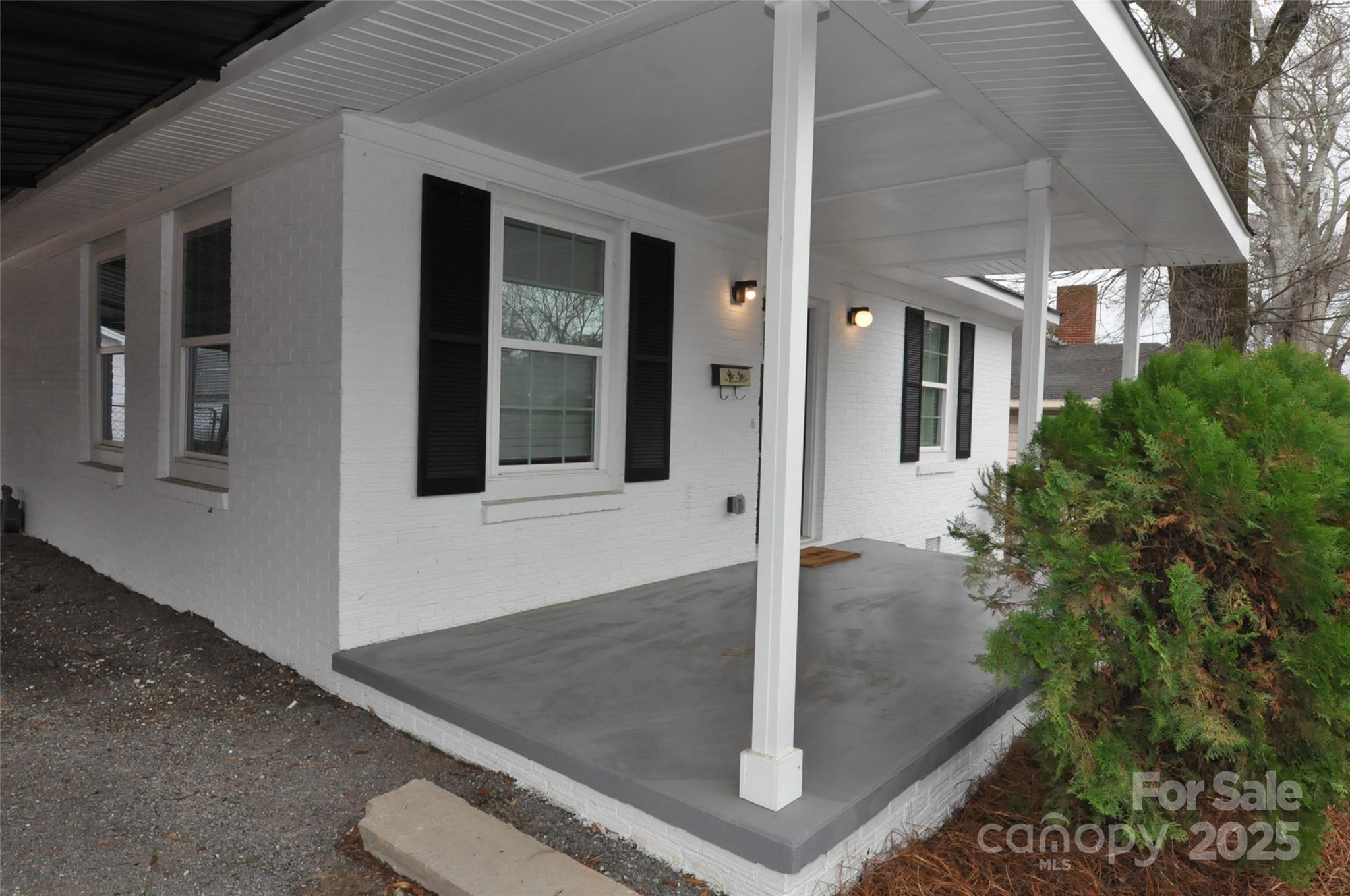 560 2nd Street, Unit 16 Chester, SC 29706 - Photo 2 of 25 a view of a street with brick wall