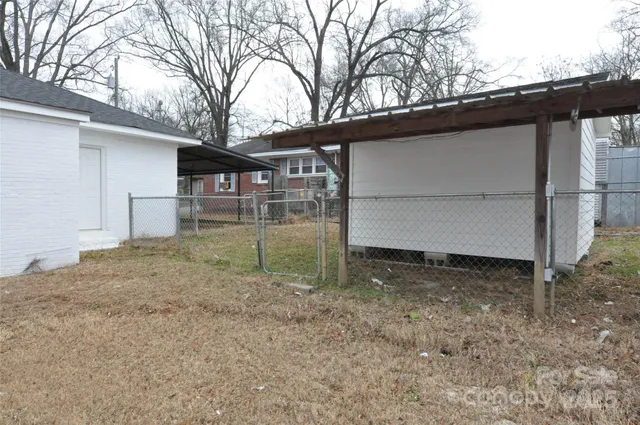 a backyard of a house with lots of green space