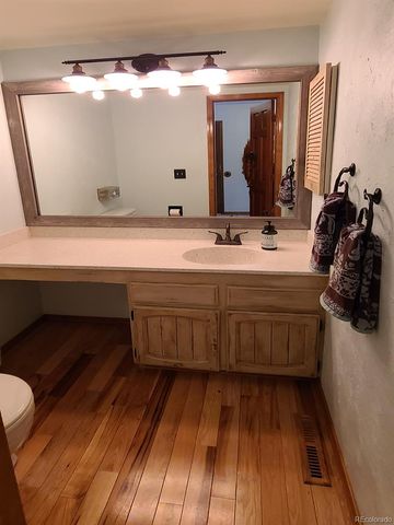 a bathroom with a sink and mirror