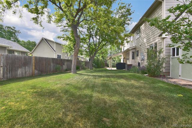 a view of a yard in front of house