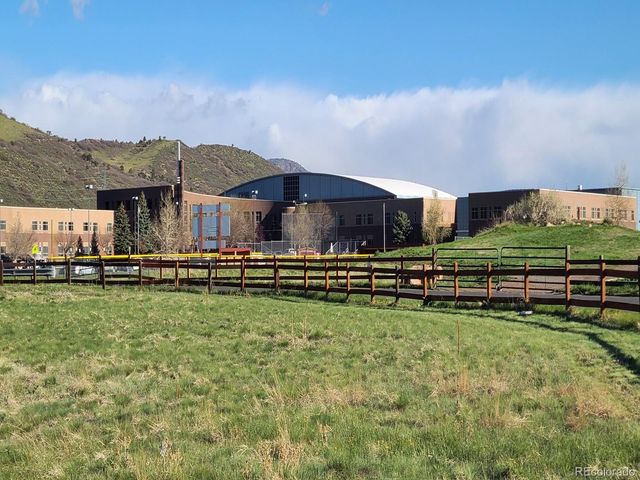 a view of a garden with houses