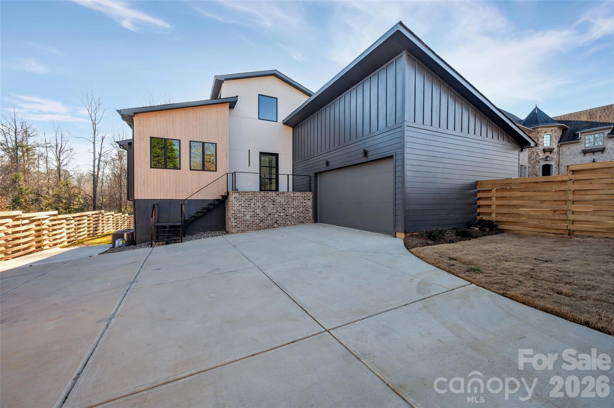 a front view of a house with a garage