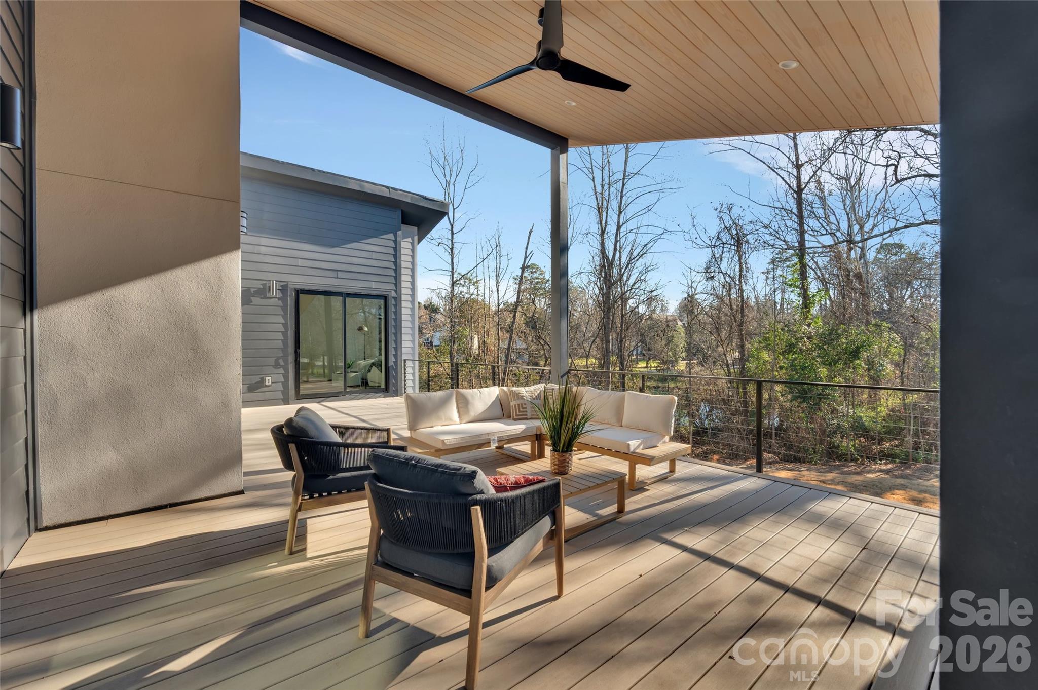 1423 South Wendover Road Charlotte, NC 28211 - Photo 13 of 31 a outdoor space with patio the couches and a potted plant on a table