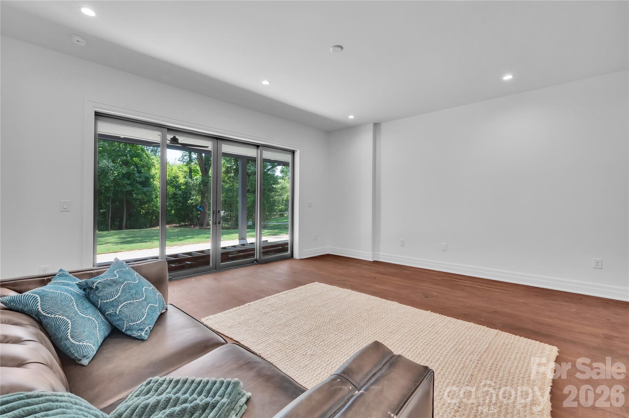 1423 South Wendover Road Charlotte, NC 28211 - Photo 22 of 31 a living room with furniture and a large window