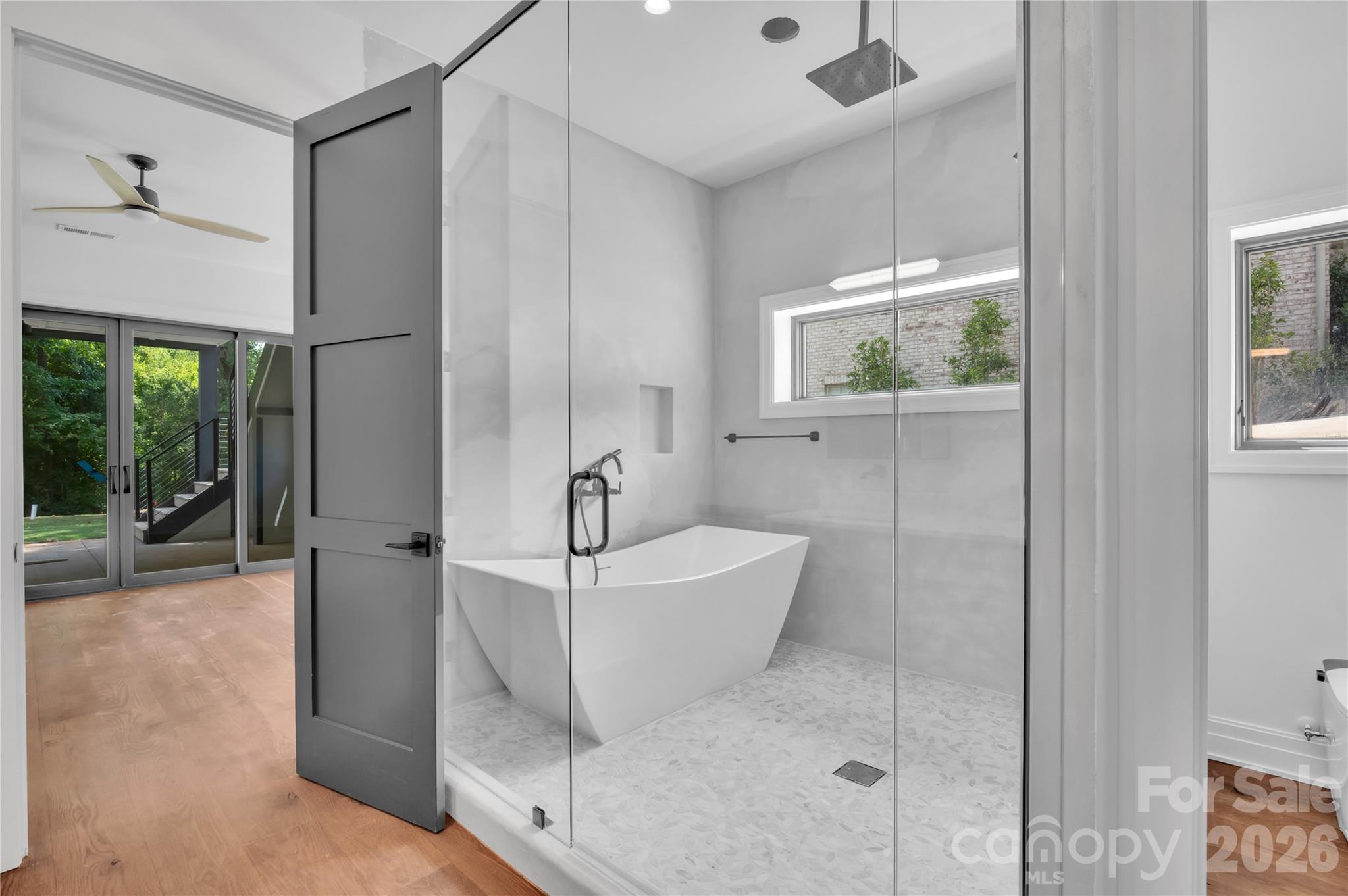 1423 South Wendover Road Charlotte, NC 28211 - Photo 28 of 31 a bathroom with a bathtub and a shower