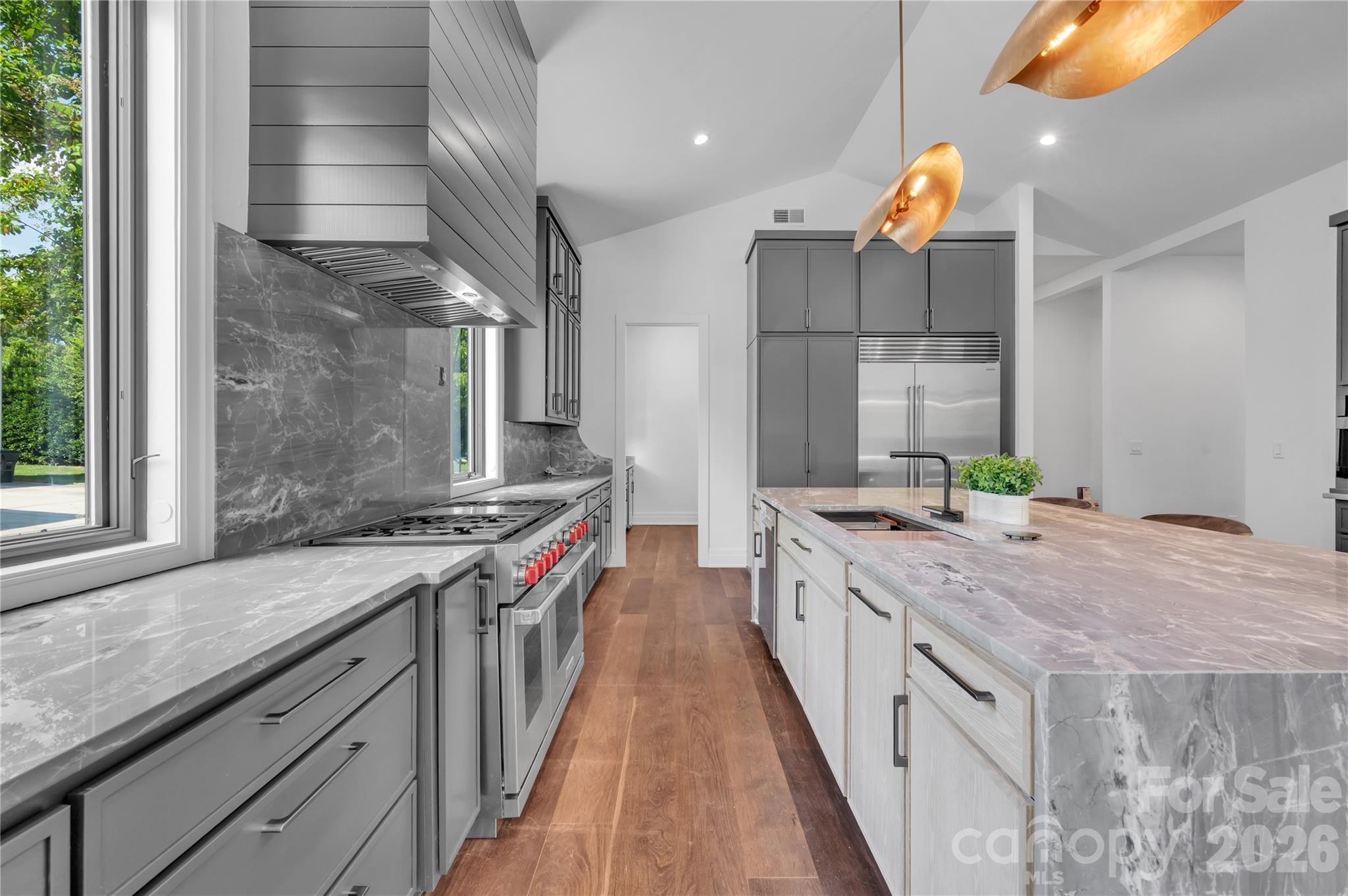 1423 South Wendover Road Charlotte, NC 28211 - Photo 5 of 31 a kitchen with stainless steel appliances granite countertop a stove and a sink