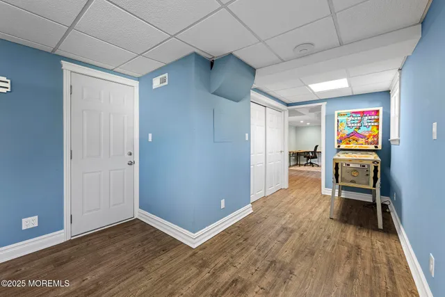 a view of livingroom with furniture and wooden floor