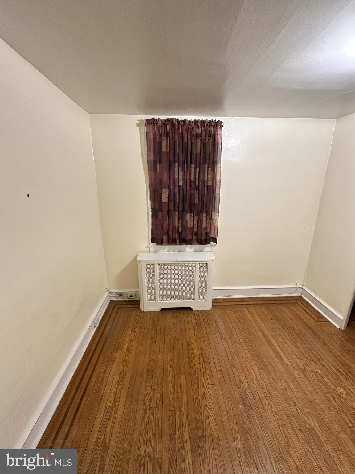 1126 Sanger Street Philadelphia, PA 19124 - Photo 13 of 21 a view of wooden floor and brick walls