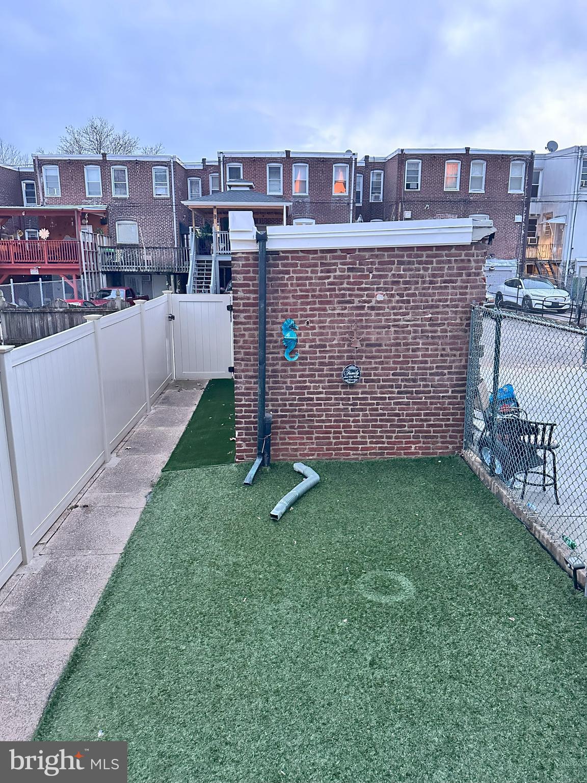 1126 Sanger Street Philadelphia, PA 19124 - Photo 21 of 21 a view of a house next to a big yard