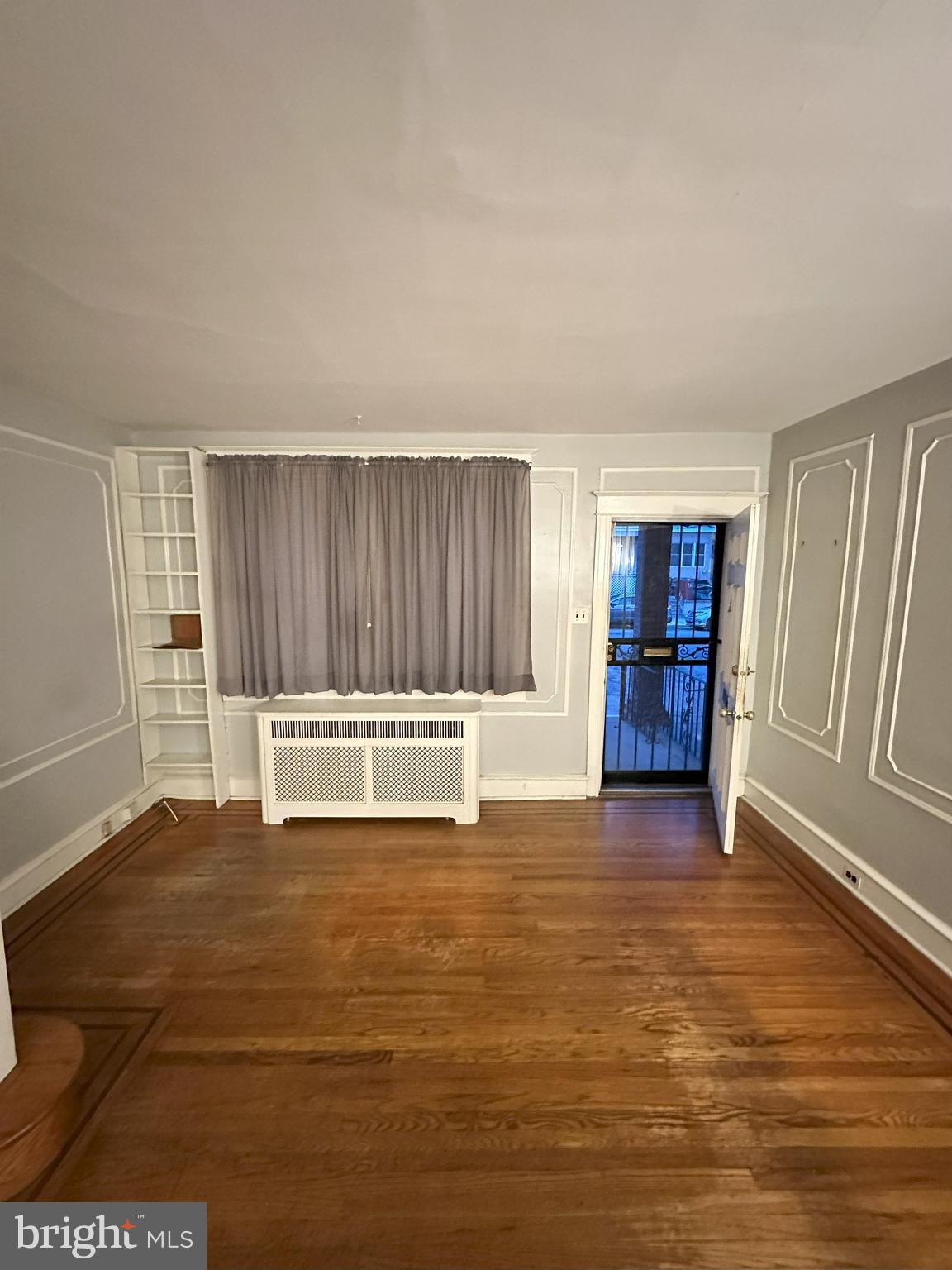 1126 Sanger Street Philadelphia, PA 19124 - Photo 3 of 21 a view of an empty room with a window