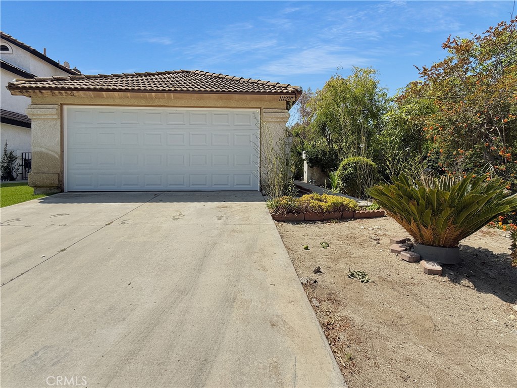 11127 Delaware Street Rancho Cucamonga, CA 91701 - Photo 2 of 18 a view of backyard of the house