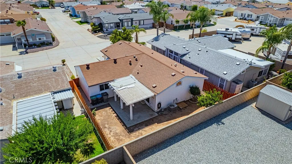 27250 Murrieta Road, Unit 216 Menifee, CA 92586 - Photo 27 of 58 an aerial view of a house with a garden