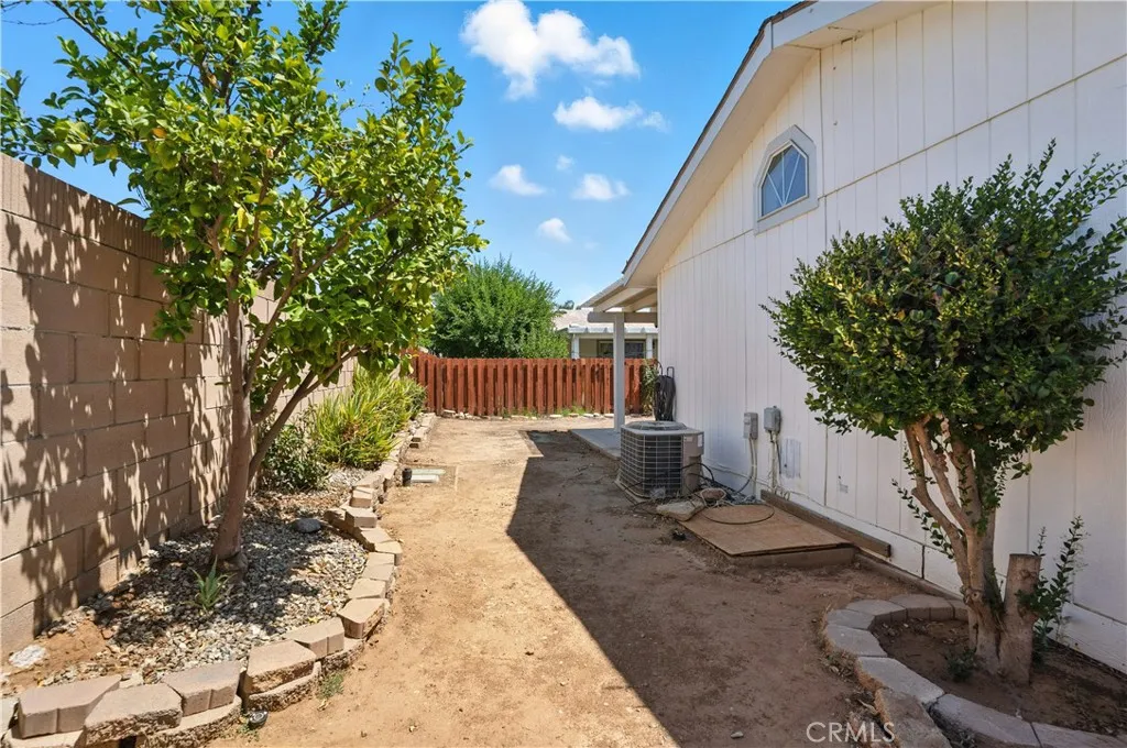 27250 Murrieta Road, Unit 216 Menifee, CA 92586 - Photo 32 of 58 a view of a backyard with sitting area