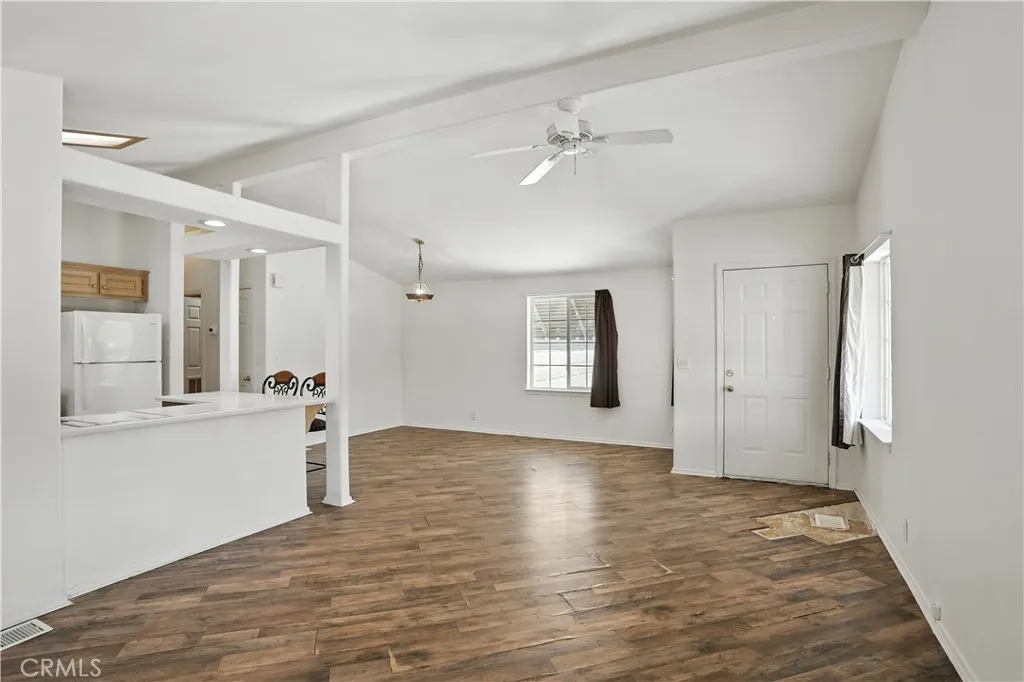 27250 Murrieta Road, Unit 216 Menifee, CA 92586 - Photo 8 of 58 a view of a big room with wooden floor and windows